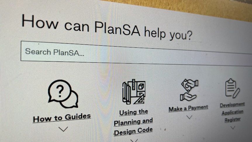 A photo of detail from a website with text reading 'How can PlanSA help you?'