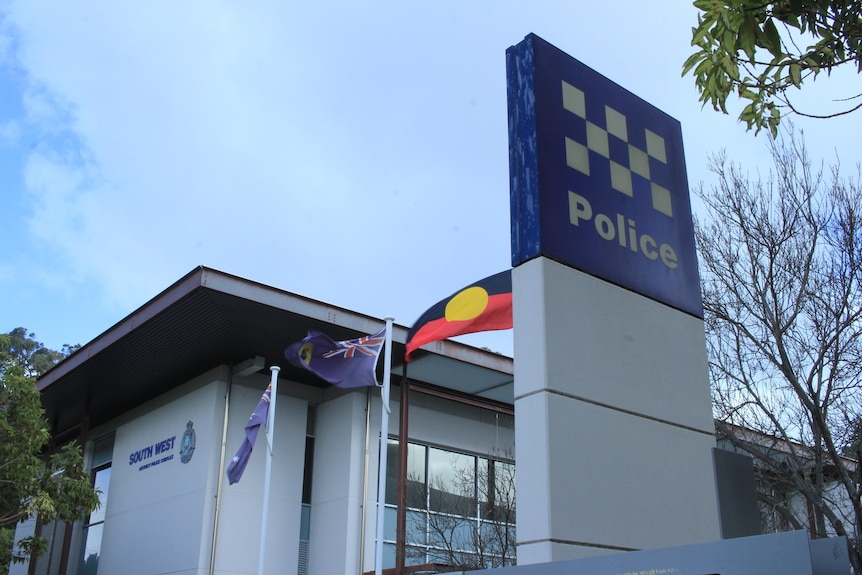 A police station with South West police district written on it. there are Aboriginal and Australian flags written on it.