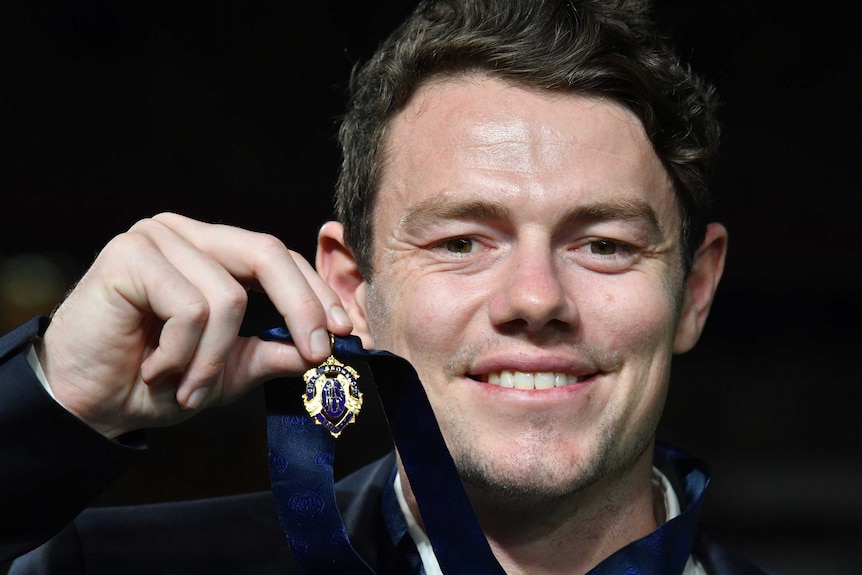 Lachie Neale wins Brownlow Medal as AFL's best and fairest ahead of