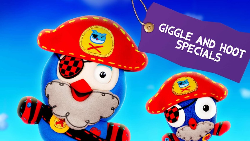 Giggle and Hoot wearing a red pirates hat and black and red checker eye patch