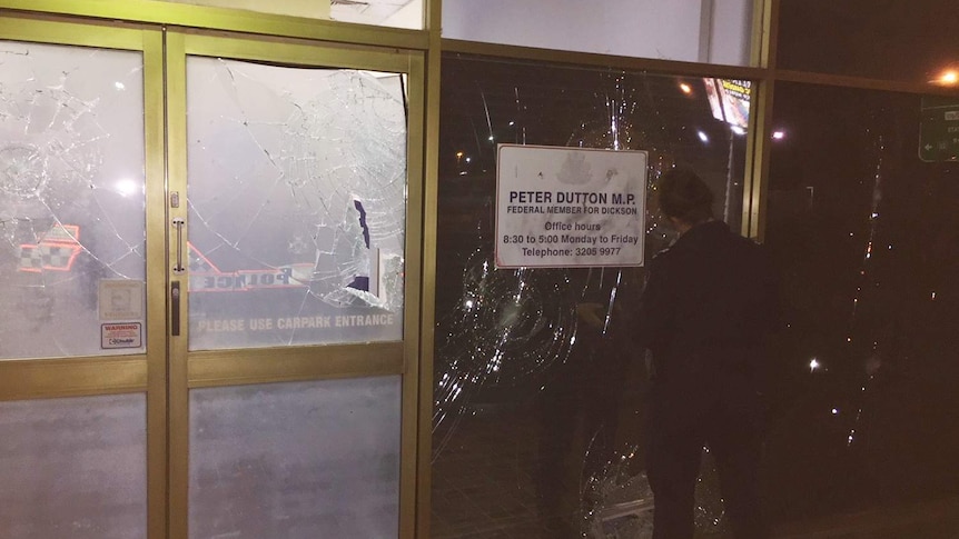 Smashed windows and doors at the electorate office of federal Liberal MP Peter Dutton at Strathpine, north of Brisbane.