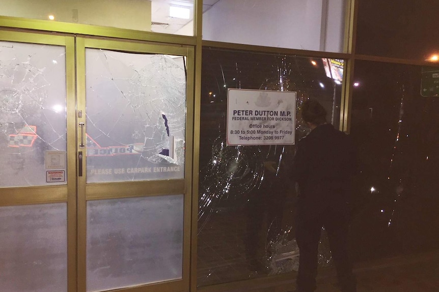 Smashed windows and doors at the electorate office of federal Liberal MP Peter Dutton at Strathpine, north of Brisbane.