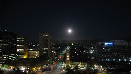 Moon rising over Adelaide Nearly 1,000 man-made satellites are orbiting the earth. (Photographer:: Ian Townsend)