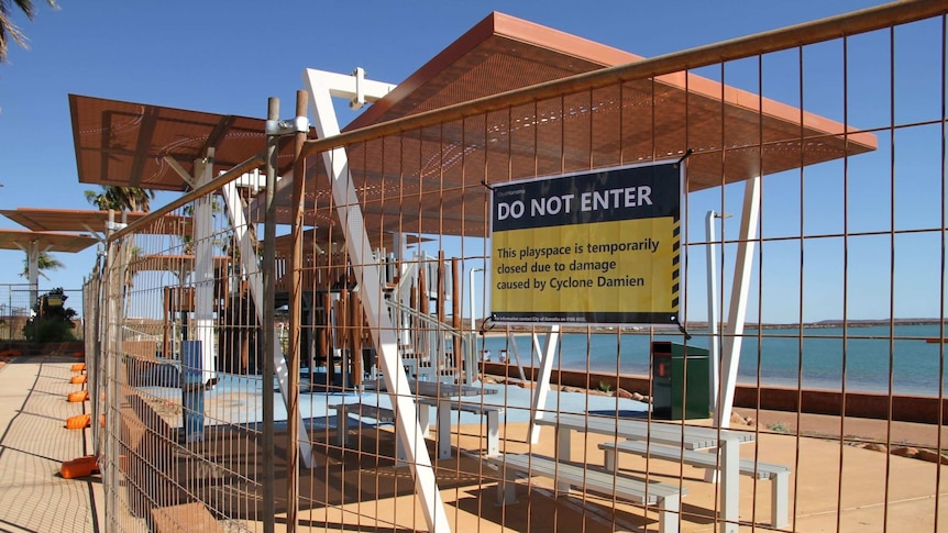 A fence with a Do Not Enter sign