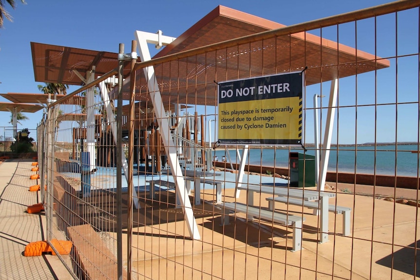 a fence with a sign