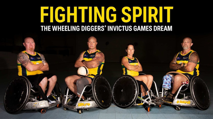 Wheelchair rugby team sitting with their arms crossed