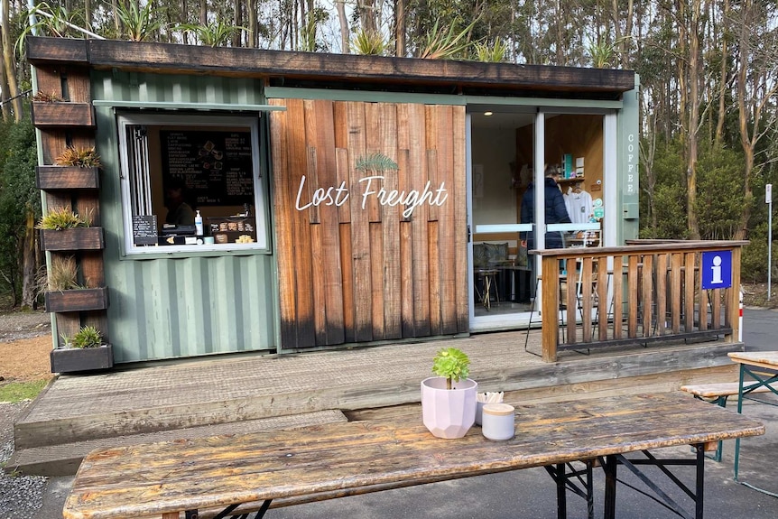 A shipping container cafe nestled in the wilderness