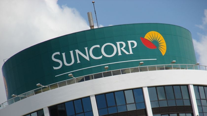 Generic TV still of logo and signage on top of Suncorp building in Brisbane CBD in Qld