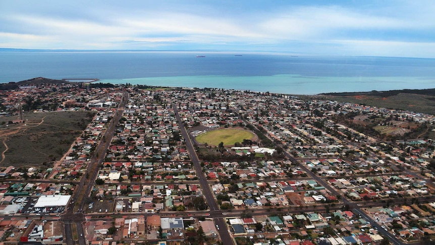 An aerial view of a sprawling regional city.