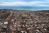 An aerial view of a sprawling regional city.