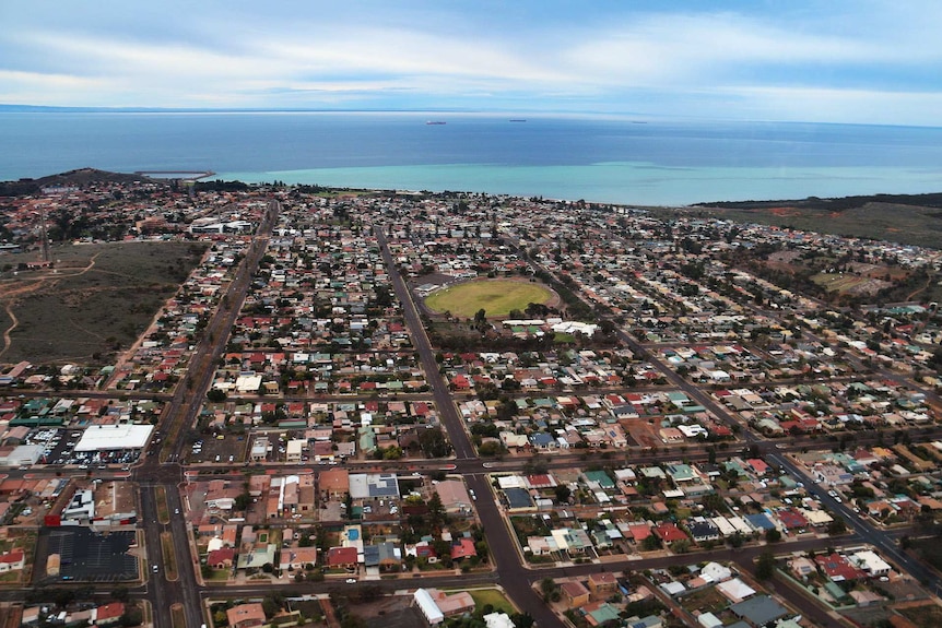 An aerial view of a sprawling regional city.