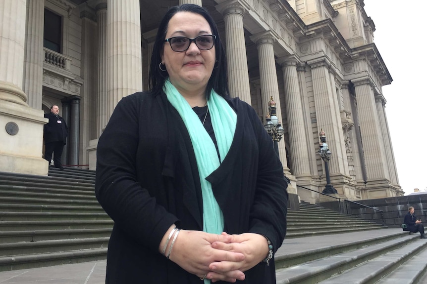 Kelly Arnett Somerville, a nurse and euthanasia campaigner, outside Victoria's Parliament.