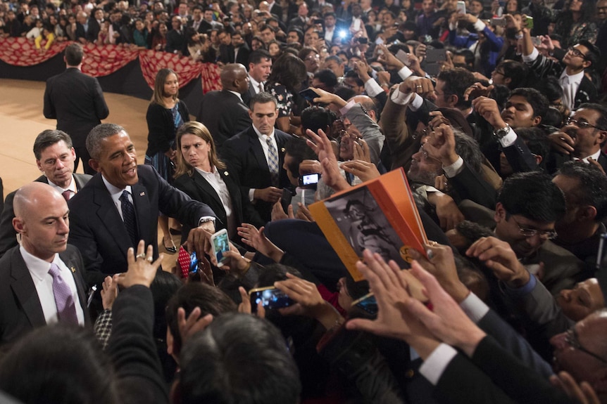 US president Barack Obama greeting the massive crowds in India