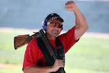 Michael Diamond celebrates world record and a win in men's trap at the 2007 world shooting titles.