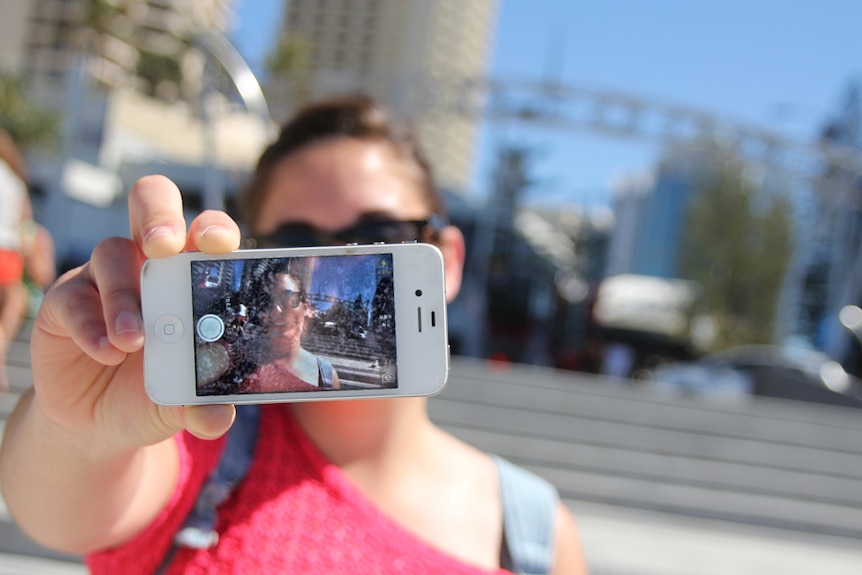 Tourist takes a selfie at Surfers Paradise, Gold Coast