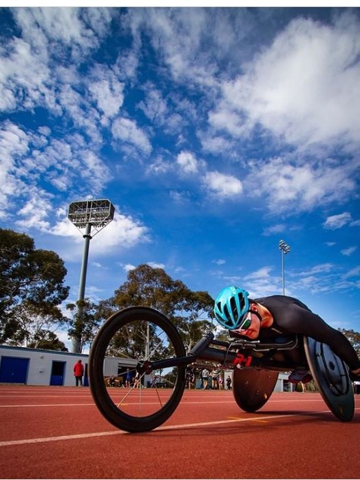 A wheelchair racer prepares to race.