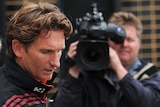 Essendon Coach James Hird leaves a Windy Hill training session on April 11.