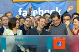 Facebook founder Mark Zuckerberg rings to NASDAQ bell