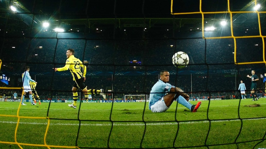 Dortmund dominate ... Julian Schieber (L) celebrates after scoring the winner against Manchester City.