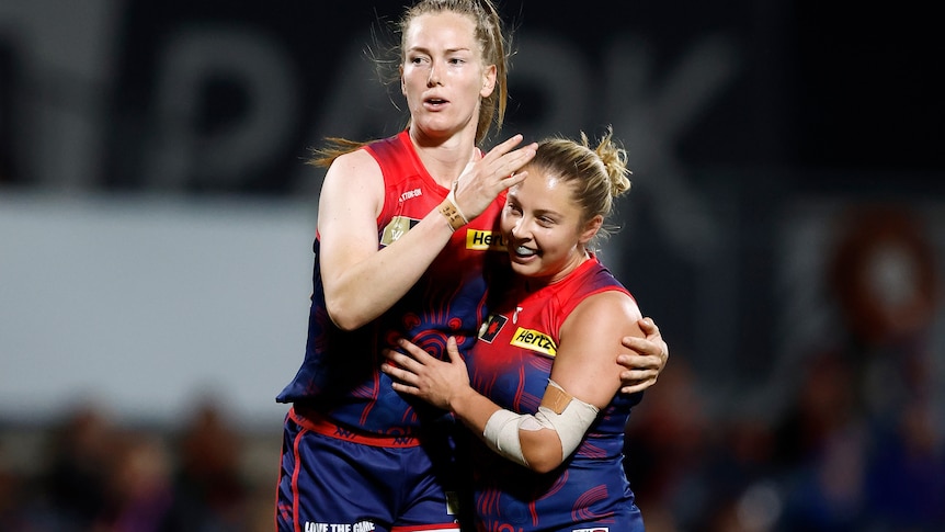 Eden Zanker (left) and Tyla Hanks of the Demons celebrate during the 2023 AFLW Round 08 match