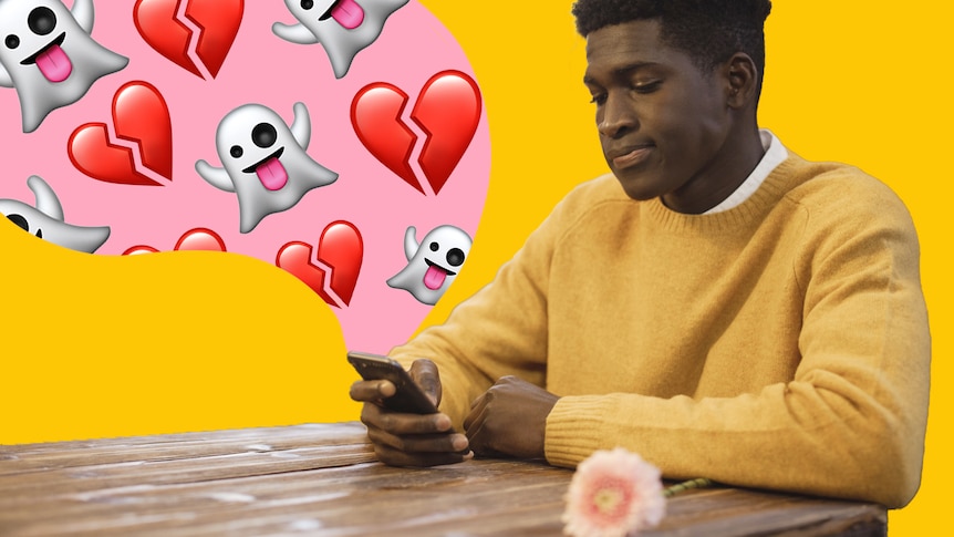 Man sits and looks sadly at phone, which has cartoon ghosts and broken hearts streaming out, in a story about rejecting dates.