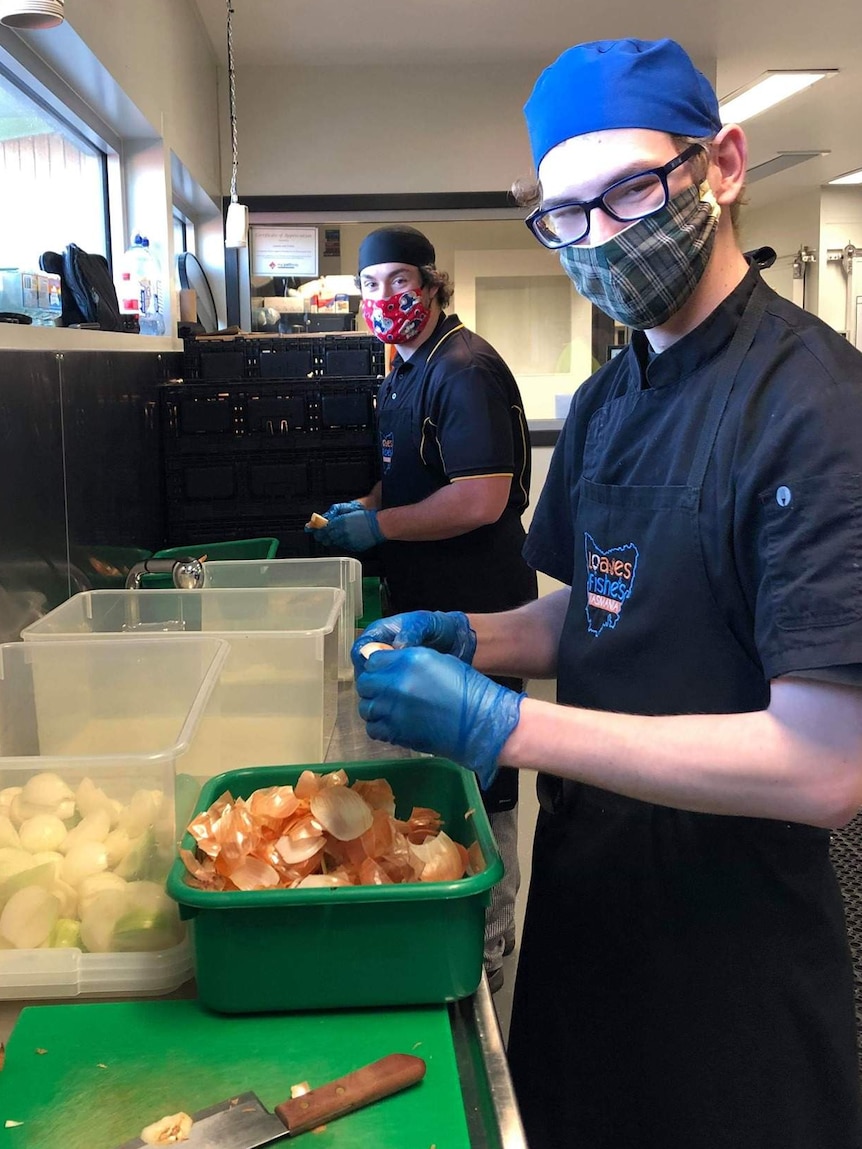 Food being prepared for Loaves and Fishes food relief.