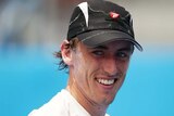 John Millman all smiles after winning in Sydney