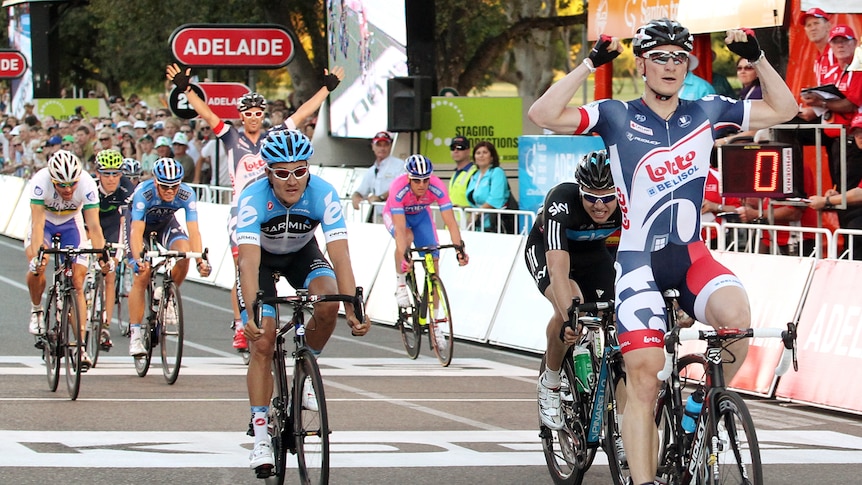 Two-time champion Andre Greipel claims victory on the line in Adelaide.