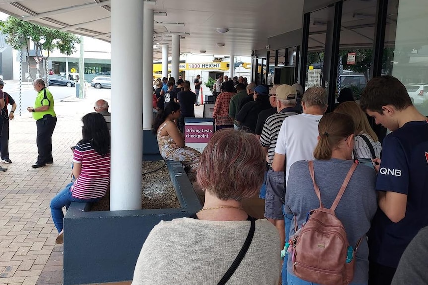 Line of people outside office