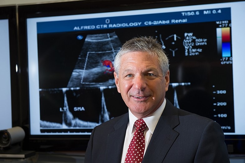 A man in a suit jacket and tie 