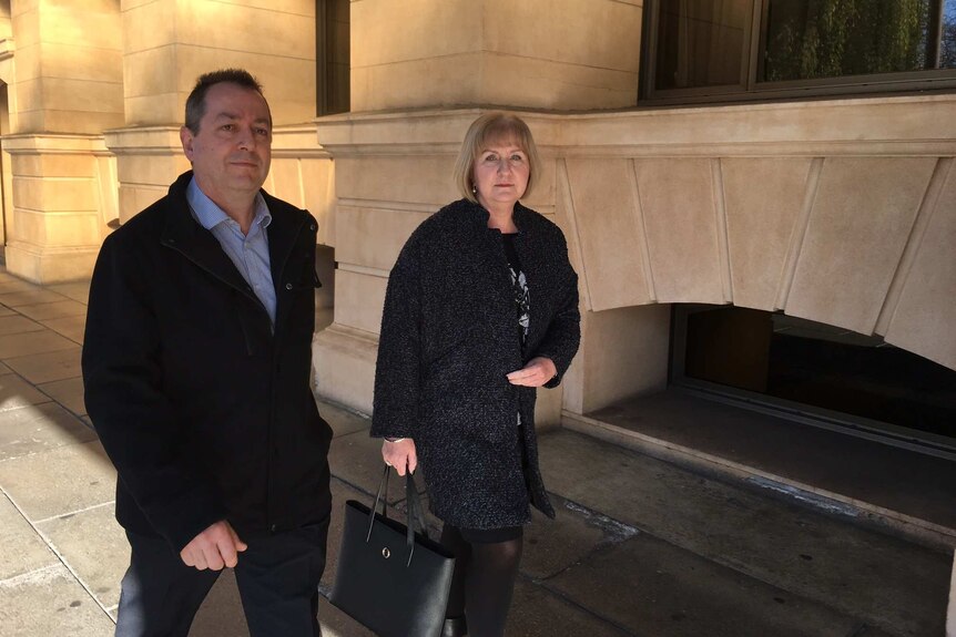 Frances Anderson (right) leaving court.