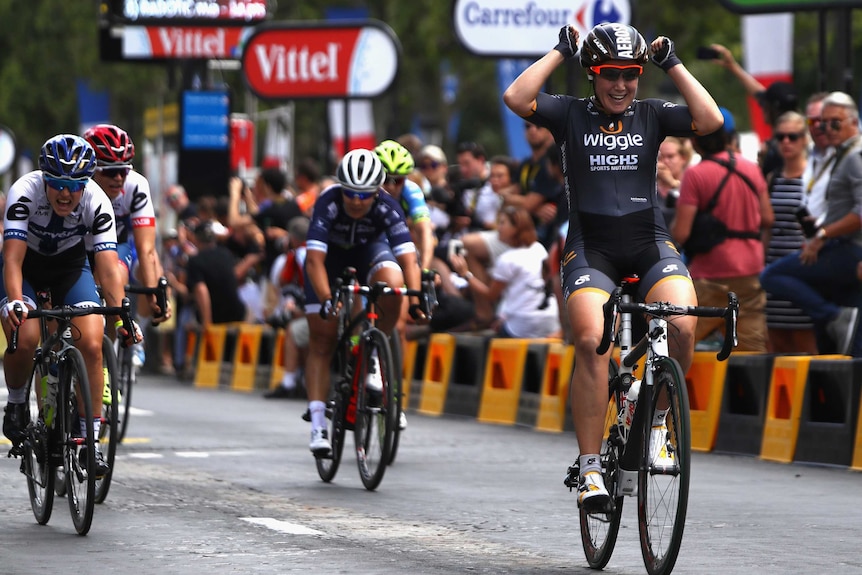 Chloe Hosking crosses the finish line to win women's Tour de France
