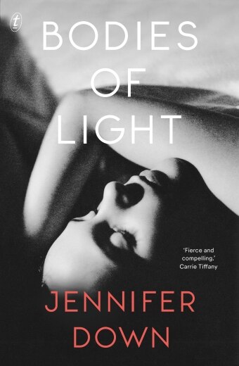 The book cover of Bodies of Light by Jennifer Down, black and white photo of a woman's face and arm