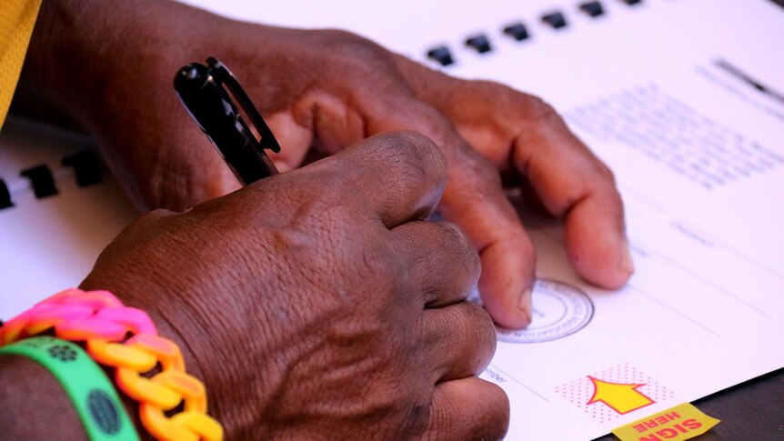 Signing a land hand back document