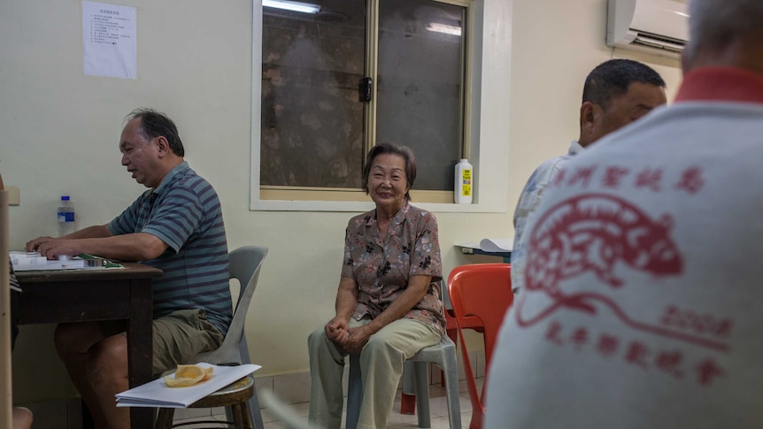 Chinese people play mahjong at the Poon Saan club on Christmas Island.