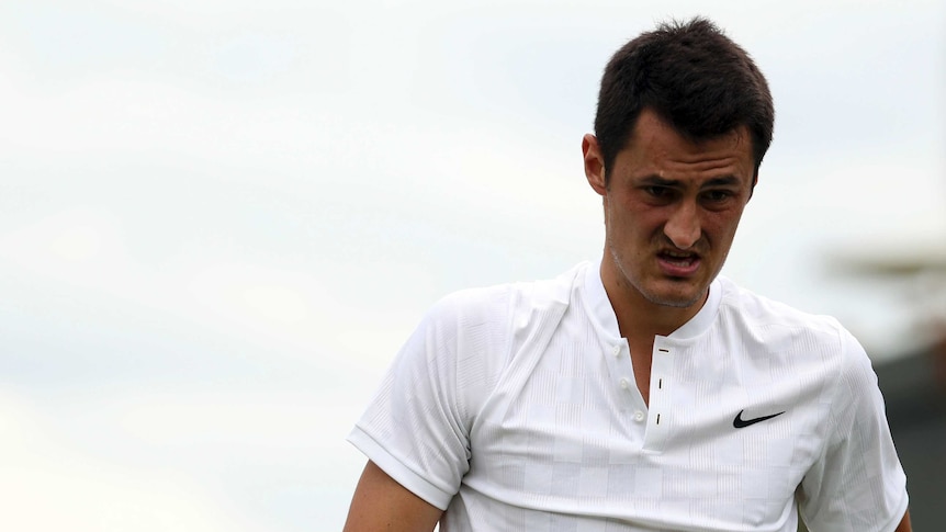 Bernard Tomic in round one at Wimbledon 2017