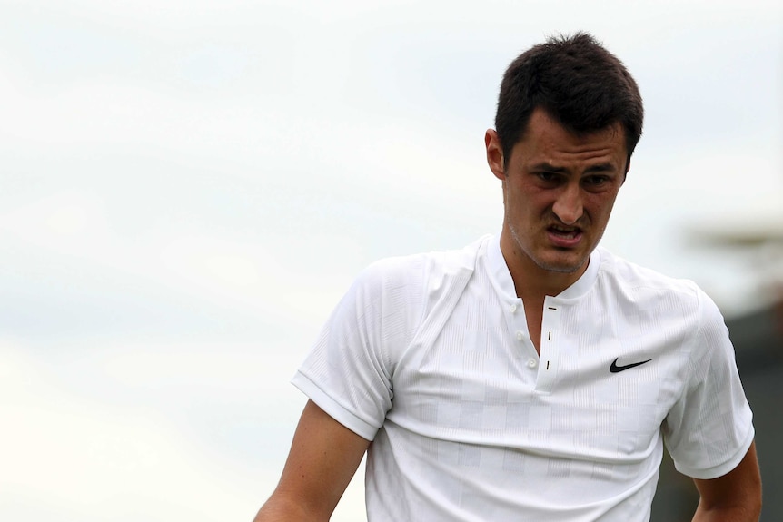 Bernard Tomic looks on during his match against Germany's Mischa Zverev at Wimbledon in 2017.