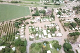 An aerial shot of extensive flooding a Queensland town.