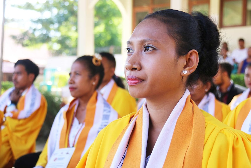 A female student at the graduation ceremony for Senai NT English Language Centre, Dili.