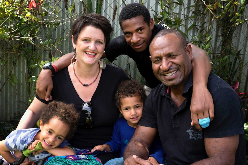 Australian woman Angela Kelly-Hanku with her husband and three children.