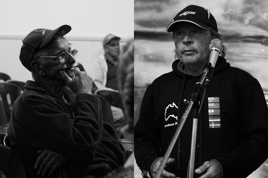 A man in the audience listens to another man about the loss of his son.