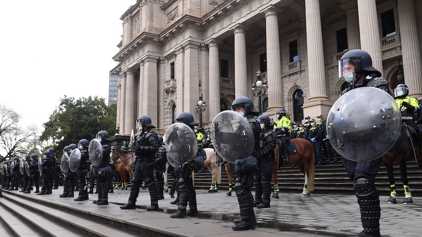 Police label protesters 'cowards' as 62 arrested after crowd storms through Melbourne's CBD
