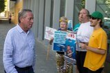 Anti-shark protesters heckle Premier Colin Barnett outside Perth ABC offices
