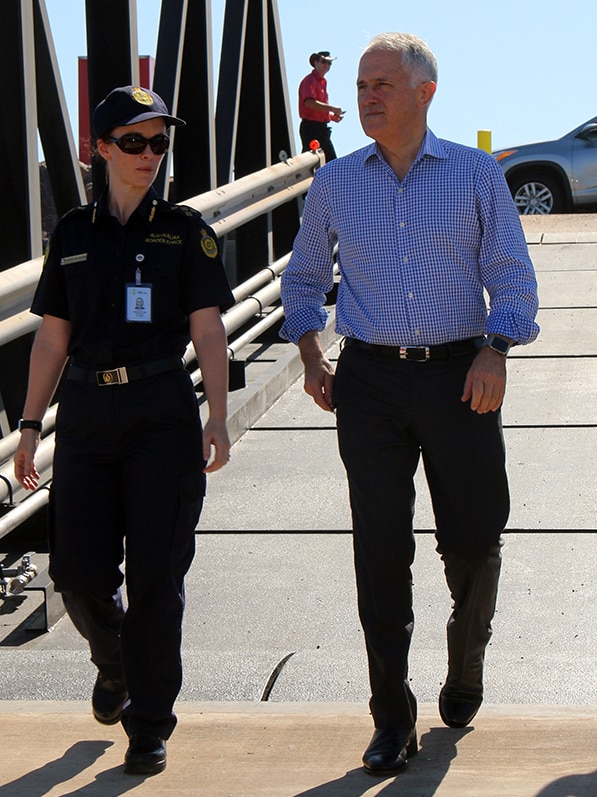 Prime Minister stands on Darwin's East Arm Wharf