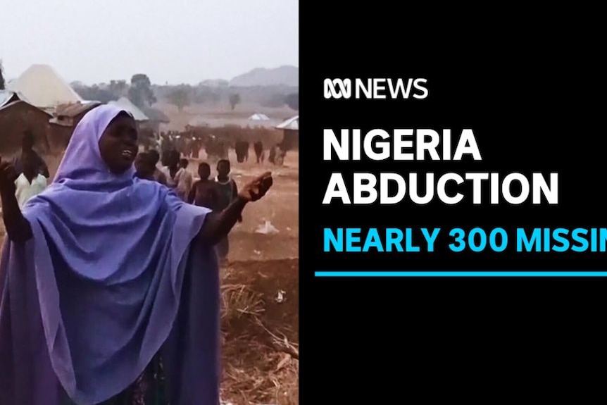 Nigeria Abduction, Nearly 300 Missing: Woman in traditional clothes holes arms up.