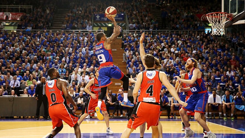 Gary Ervin flies for the Adelaide 36ers