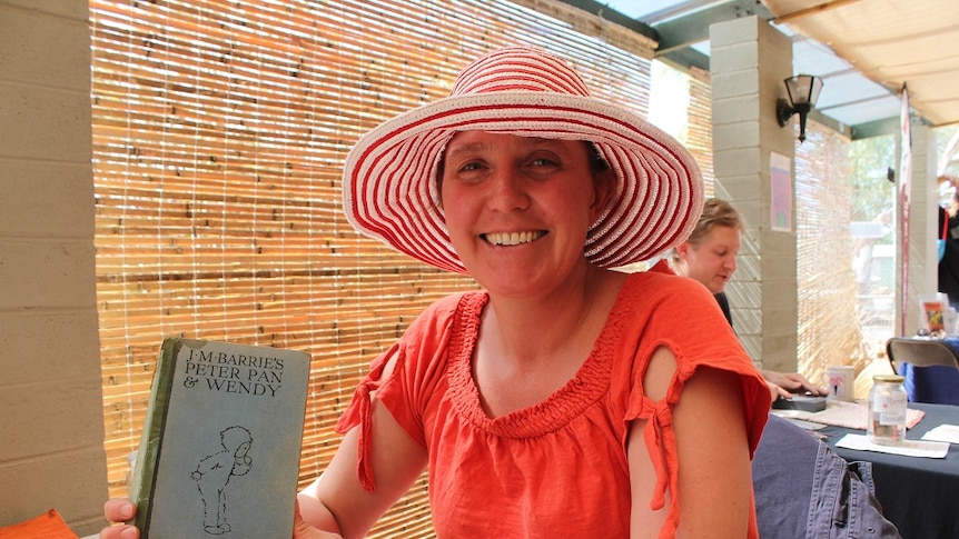 Kate Burbeck with a book