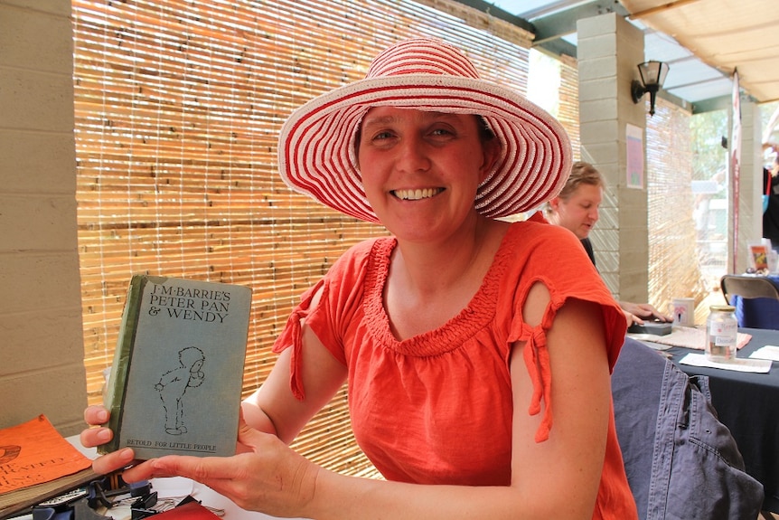 Kate Burbeck with a book