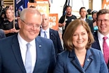 Scott Morrison with Sarah Henderson, Josh Frydenberg and others at Geelong train station.