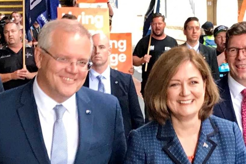 Scott Morrison with Sarah Henderson, Josh Frydenberg and others at Geelong train station.